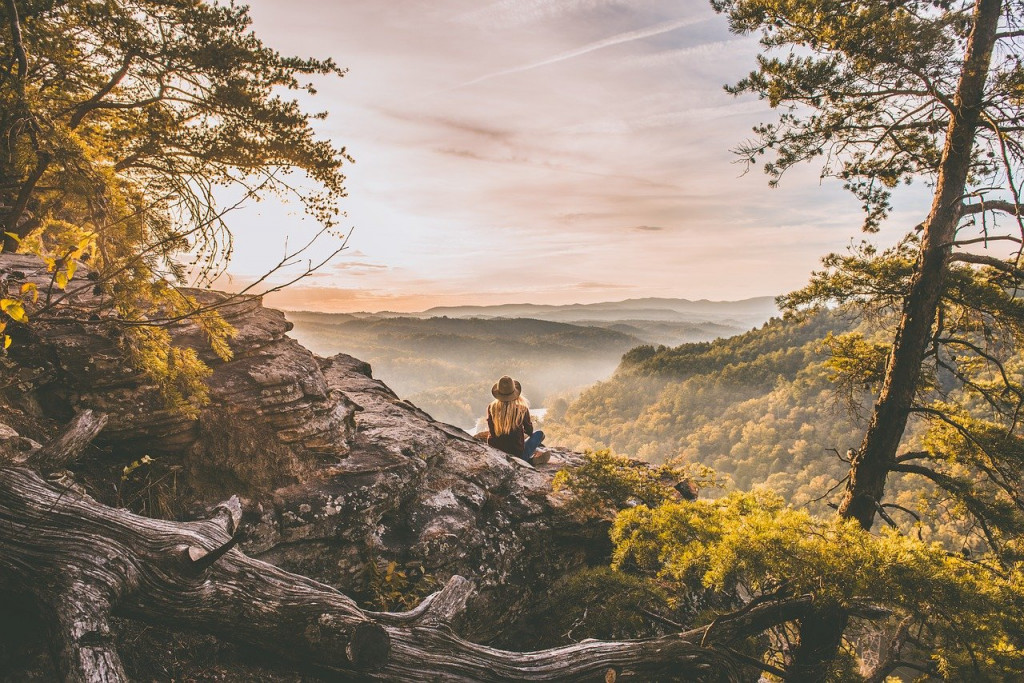 hiker sitting on the rocks